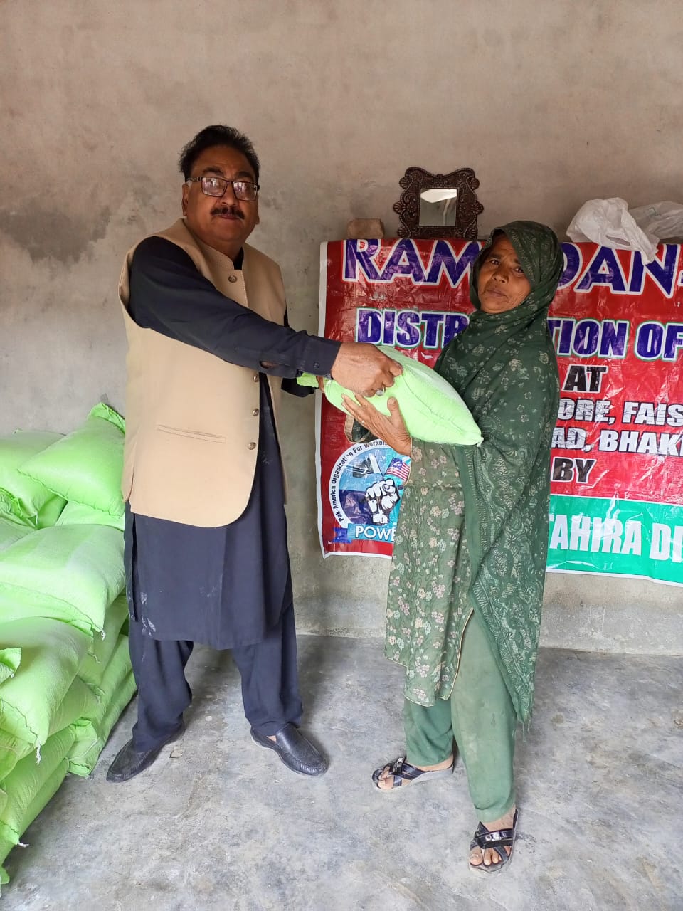 Distribution of flour at Bhakhar